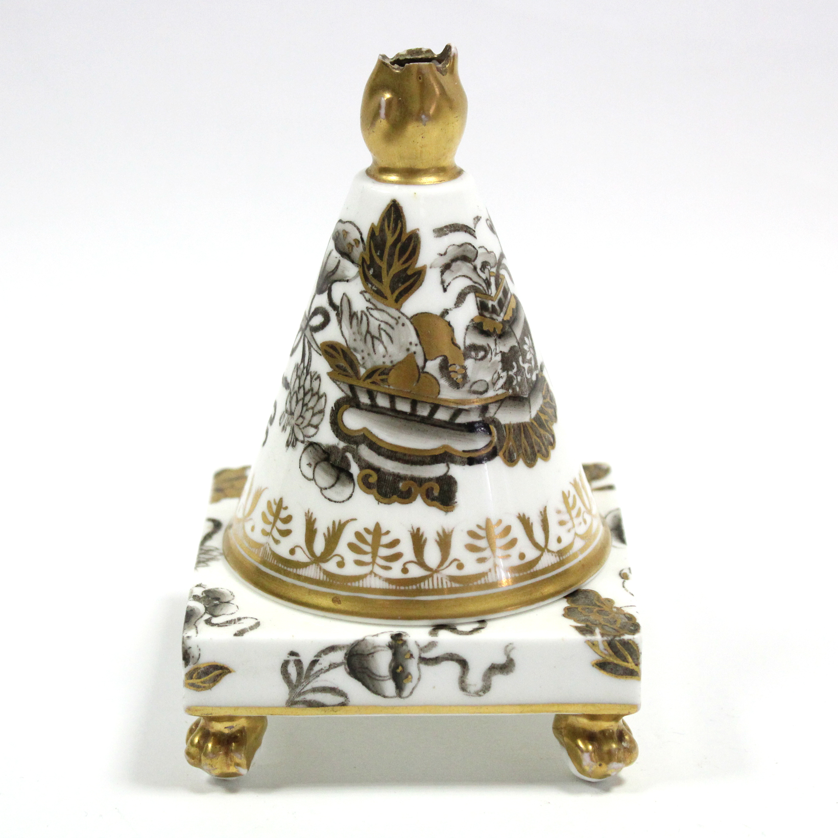 An early 19th century Spode porcelain pastille burner with cone-shaped cover on a square base with