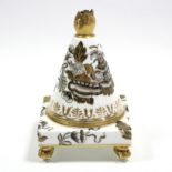 An early 19th century Spode porcelain pastille burner with cone-shaped cover on a square base with