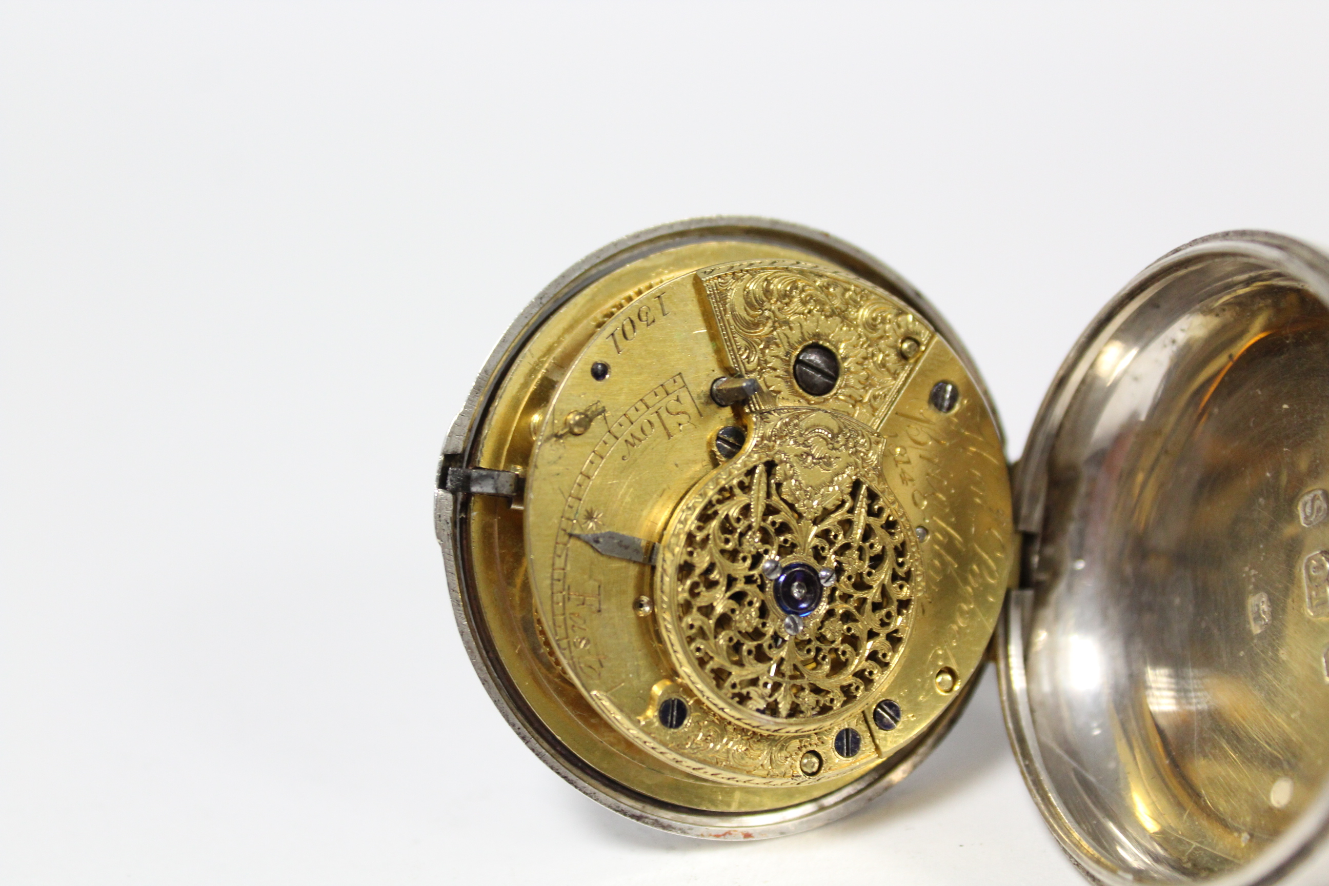 A George III silver pair-cased pocket watch with black roman numerals to the white enamel convex - Image 8 of 11