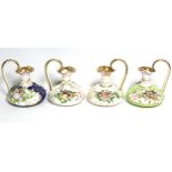 A pair of 19th century Bloor Derby porcelain squat round ewers with floral-encrusted decoration on a