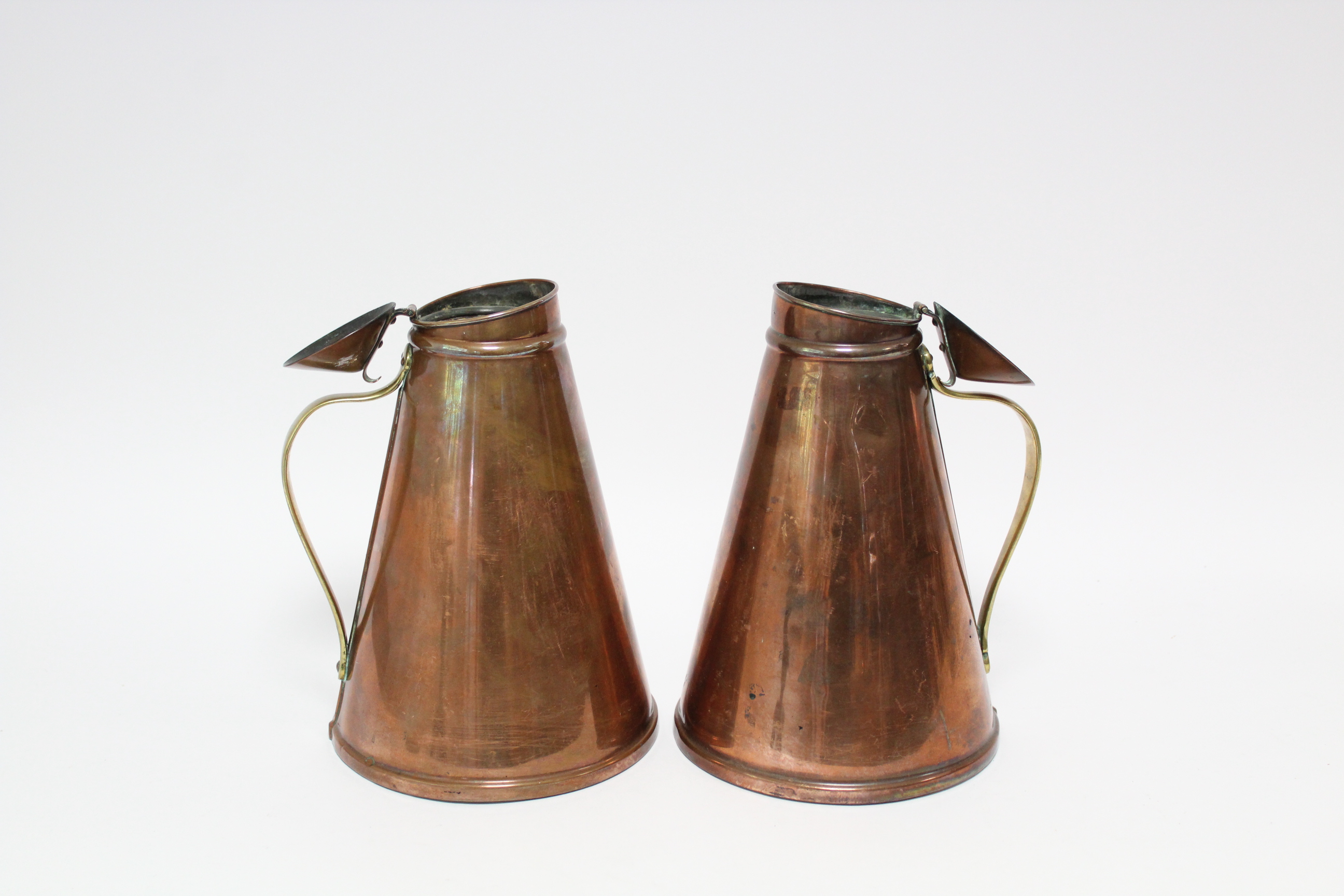 A pair of W. A. S. Benson Arts & Crafts copper “Jacketed Jugs” of tapered cylindrical form, with - Image 2 of 8