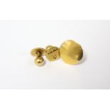 Three 18ct. gold shirt studs. (7.3gm).