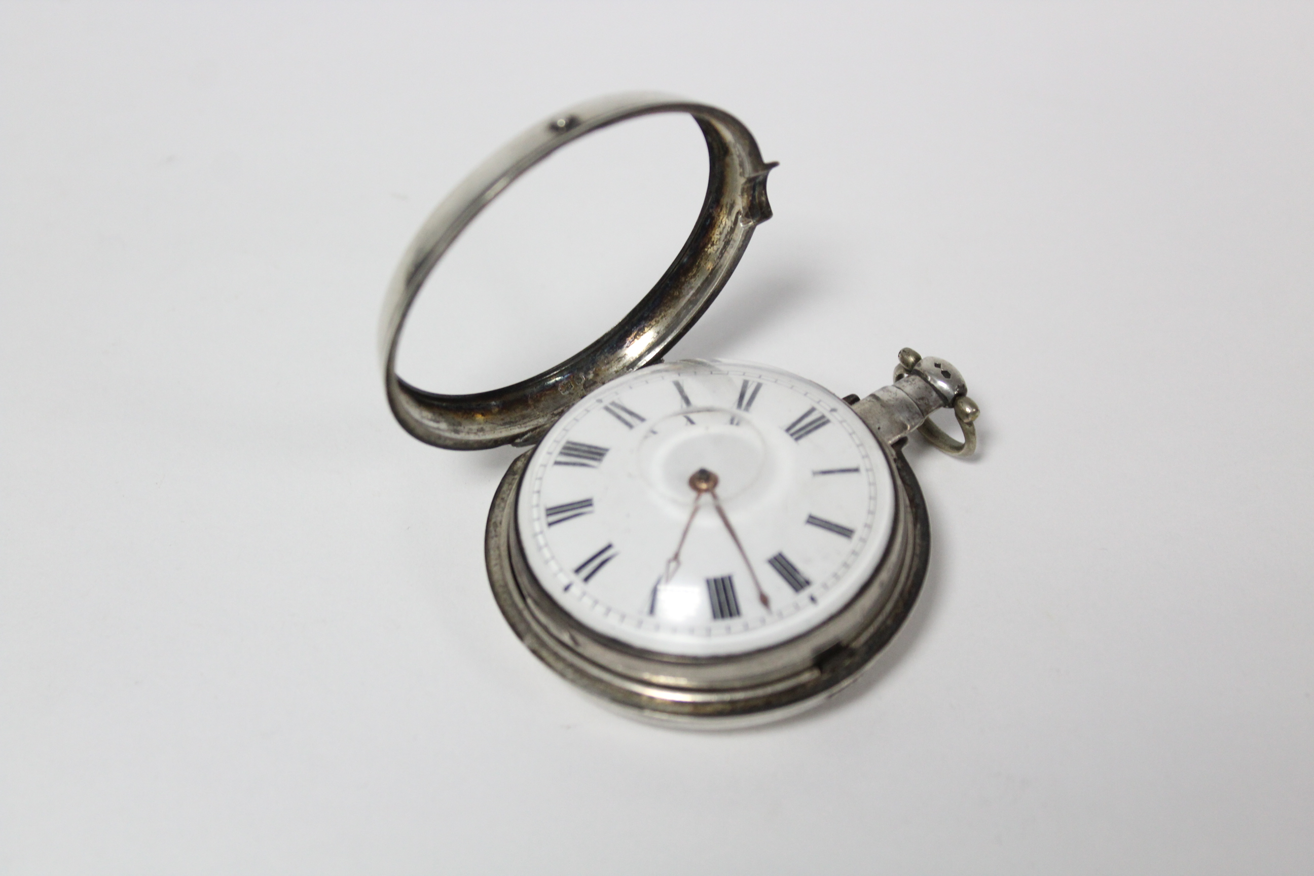 A George III silver pair-cased pocket watch with black roman numerals to the white enamel convex - Image 3 of 11