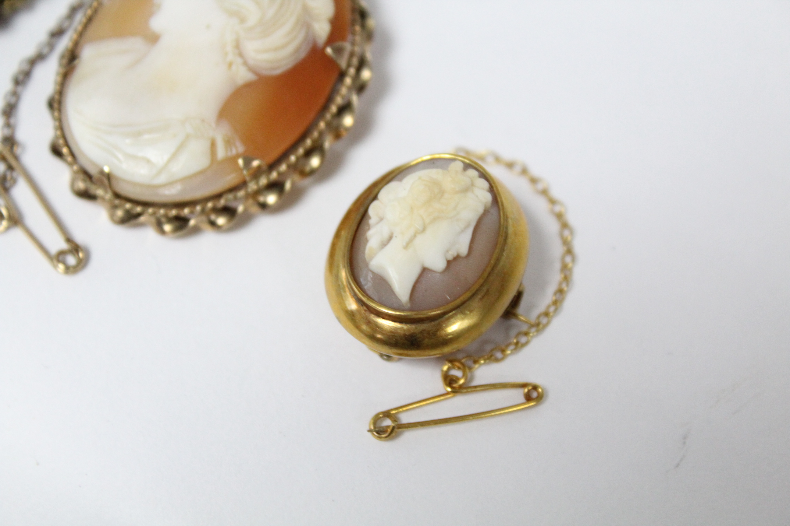 A carved shell oval cameo brooch depicting a female portrait, in 9ct. gold mount, 1½” x 1”; & two - Image 3 of 5