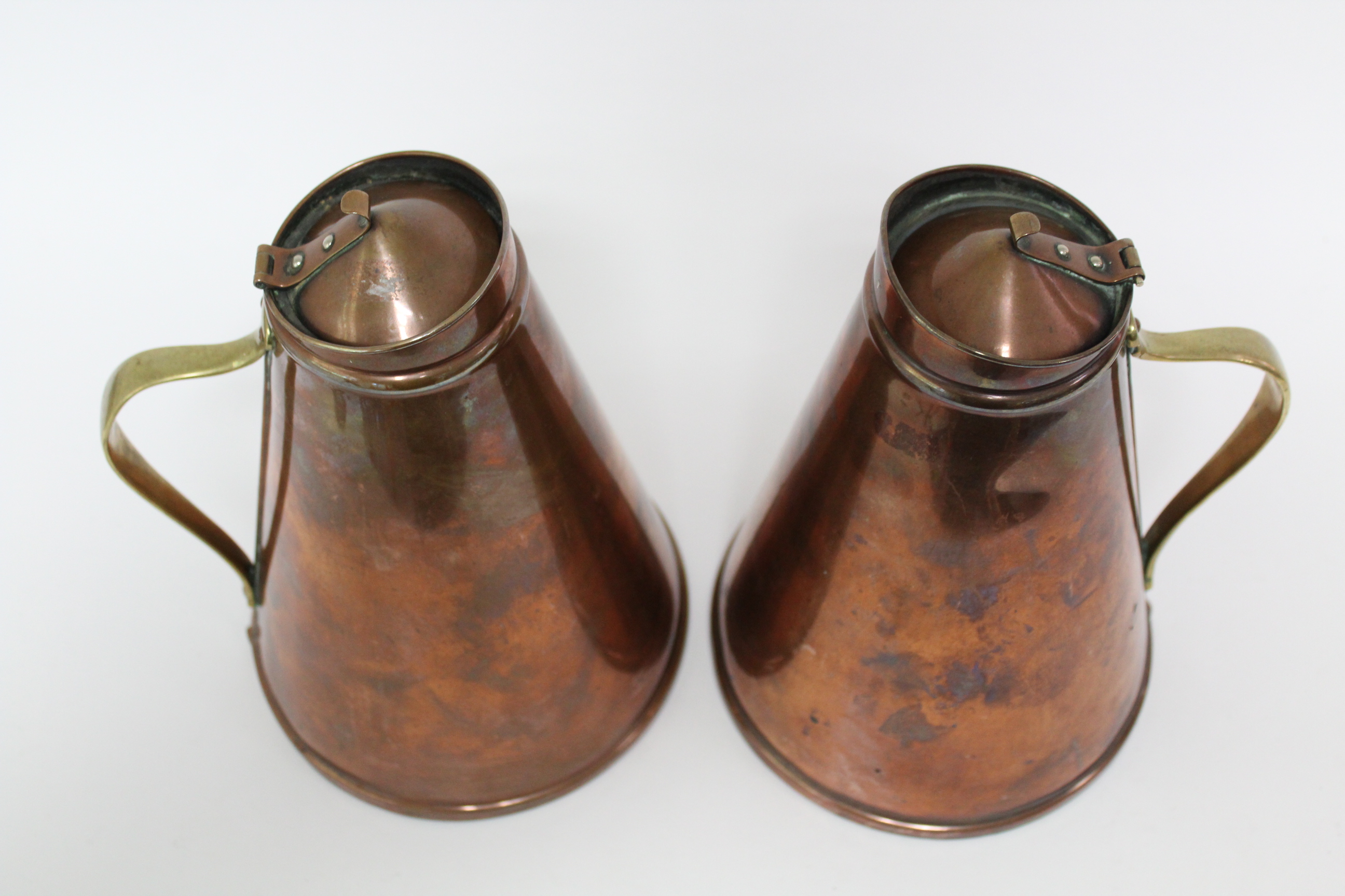A pair of W. A. S. Benson Arts & Crafts copper “Jacketed Jugs” of tapered cylindrical form, with - Image 4 of 8