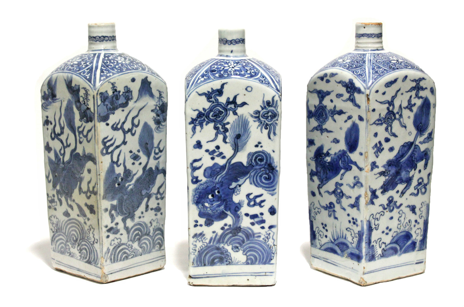 THREE CHINESE BLUE-&-WHITE PORCELAIN BOTTLE VASES, each of square section with short cylindrical