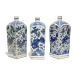 THREE CHINESE BLUE-&-WHITE PORCELAIN BOTTLE VASES, each of square section with short cylindrical