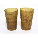 A pair of 19th century horn beakers, each engraved with hunting scenes & signed “W. Parry”; 4”