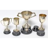 A George V two-handled trophy cup, Sheffield 1924, by Fattorini & Sons Ltd; together with three