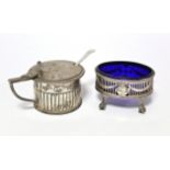 A George IV cylindrical mustard pot with fluted sides & hinged lid; London 1823, by William Eaton; &