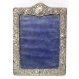 A late Victorian rectangular photograph frame with all-over embossed floral decoration, Sheffield