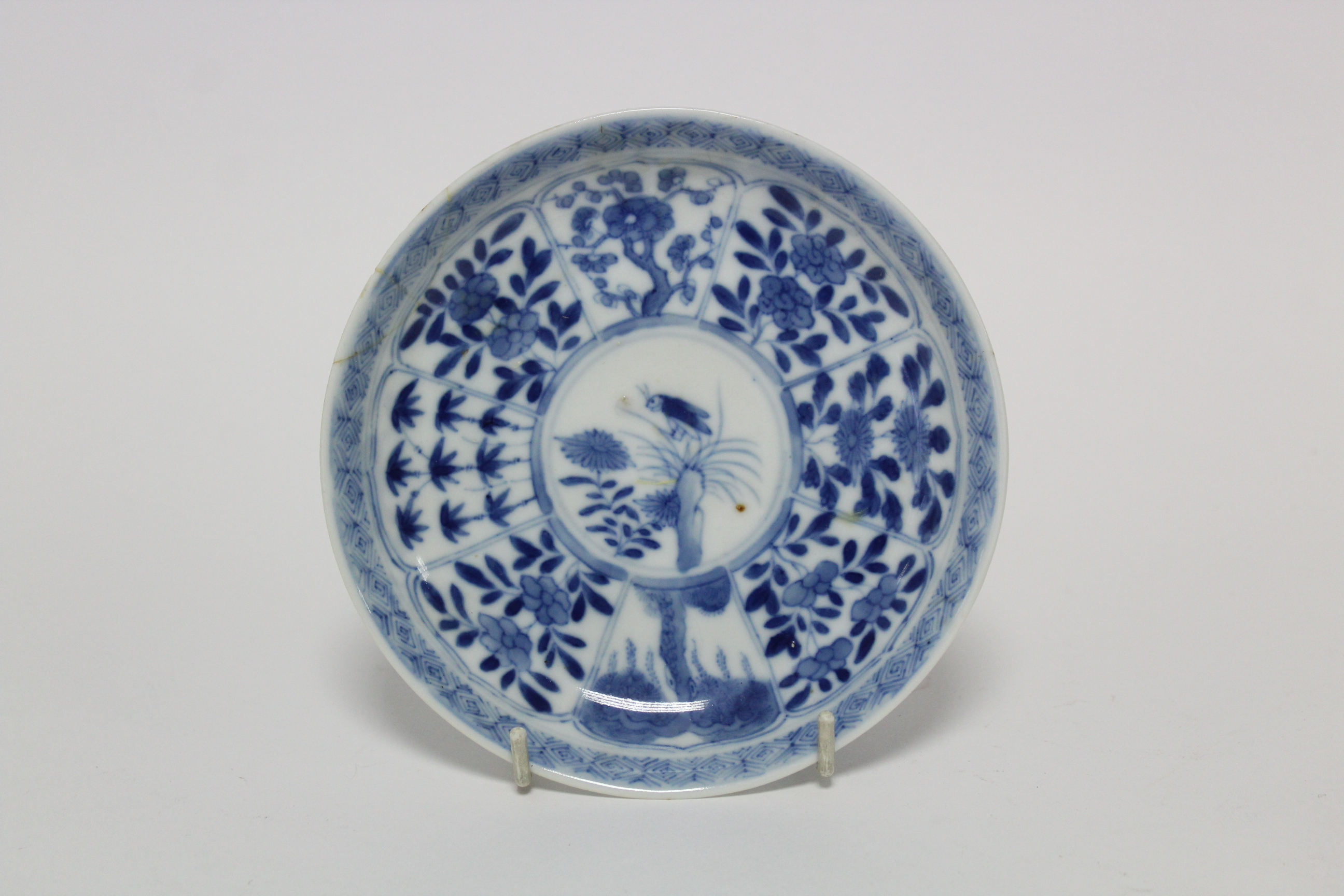 A Chinese blue & white porcelain deep bowl with lotus rim, painted with panels of deer amongst - Image 20 of 24
