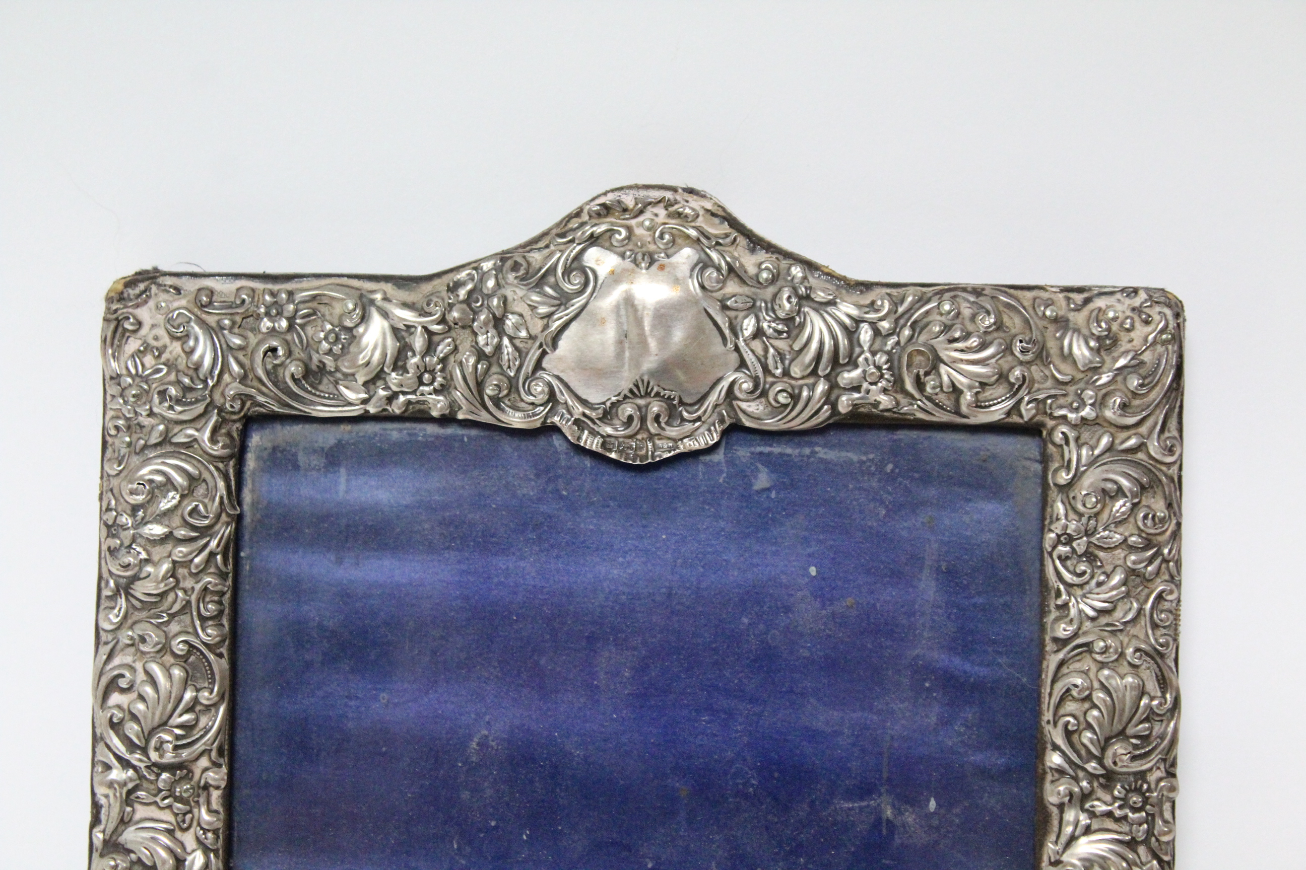 A late Victorian rectangular photograph frame with all-over embossed floral decoration, Sheffield - Image 2 of 3