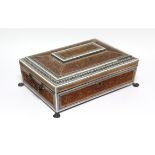 A 19th century Anglo-Indian sandalwood & ivory needlework box with hinged lid, profusely carved with