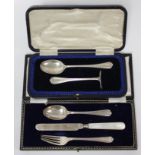 A silver baby’s food pusher & spoon in fitted case; Sheffield 1915/16 by Cooper Brothers & Sons