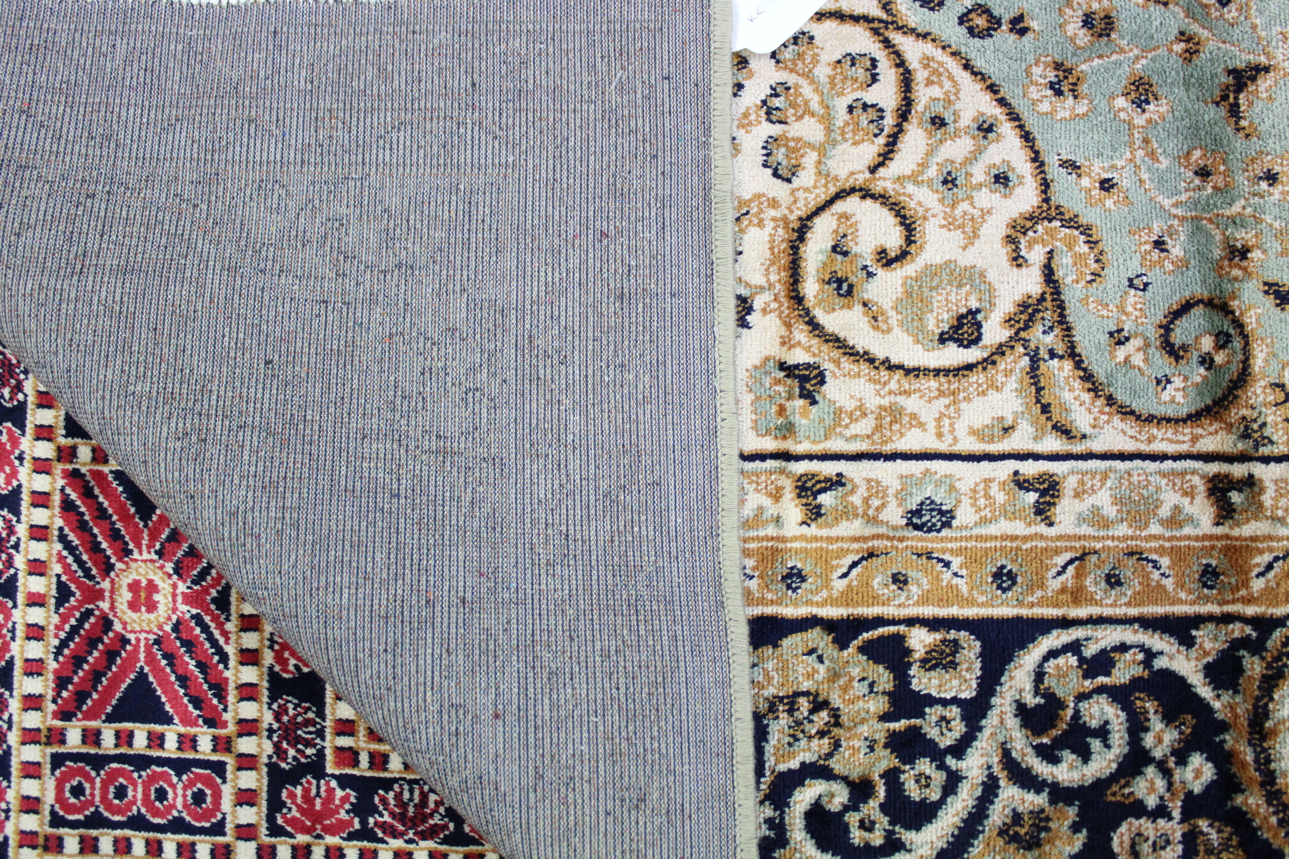 A Keshan carpet of pale green & deep blue ground & with all-over repeating multi-coloured - Image 2 of 2