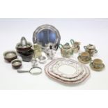 An epns bachelor’s three-piece tea service; a plated circular tray; a magnifying glass with white-