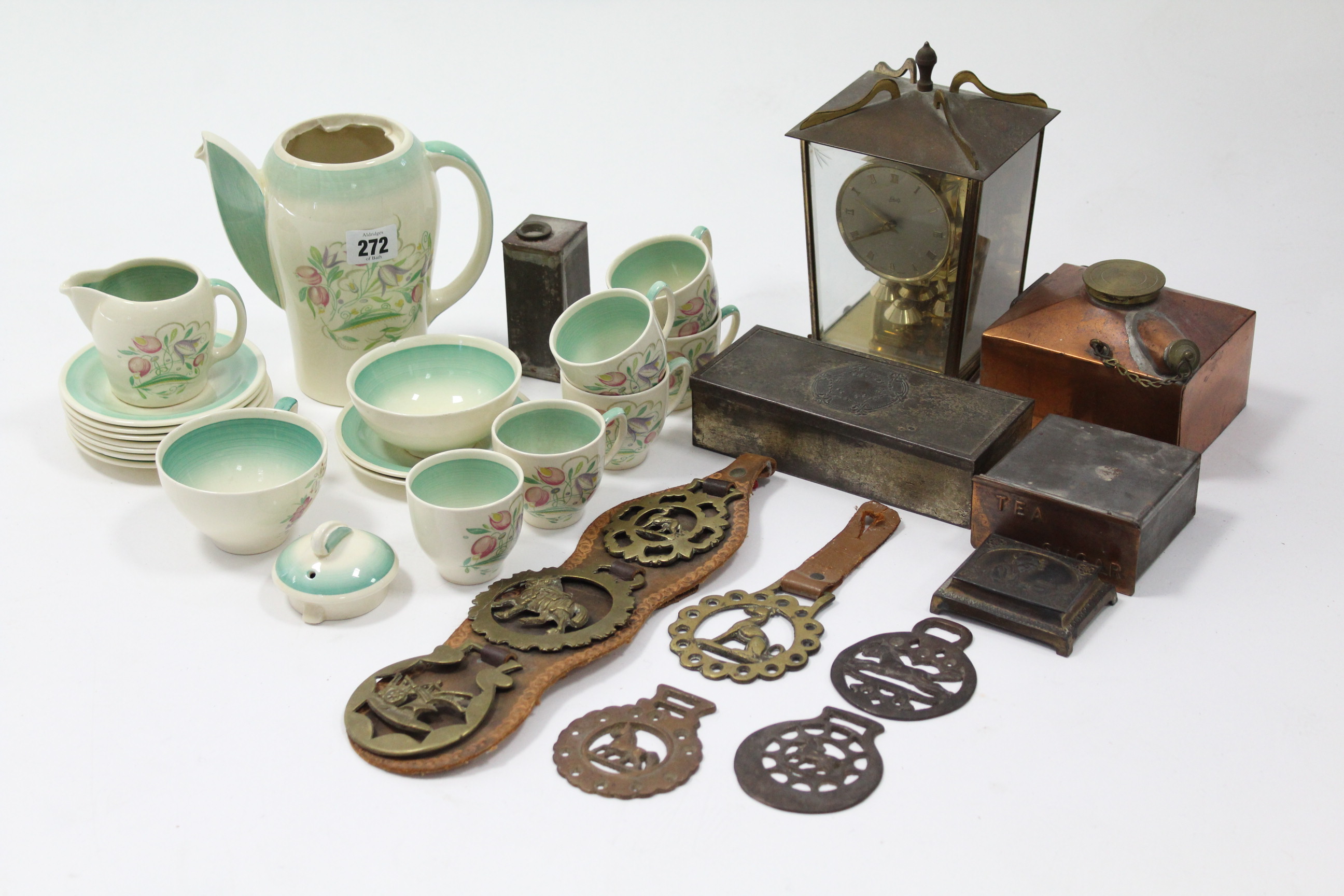 Nineteen items of Susie Cooper floral decorated tea & coffee ware, part w.a.f.; a brass-cased mantel