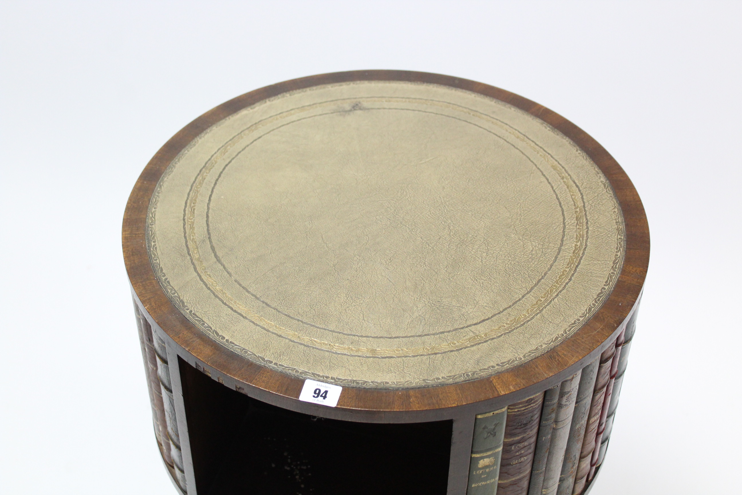 A reproduction mahogany book table inset gilt-tooled grey leather to the circular revolving top, - Image 3 of 4