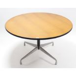 A Herman Miller chrome & black finish dining table on cylindrical centre column & four splay legs, &