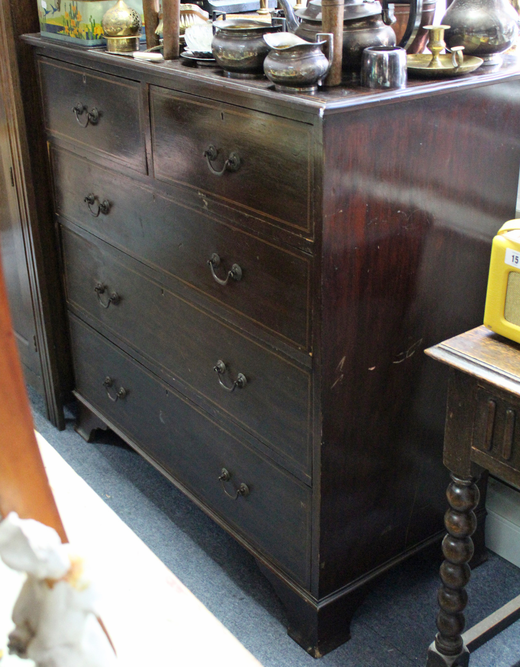 A 19th century inlaid-mahogany chest fitted two short & three long graduated drawers with swing