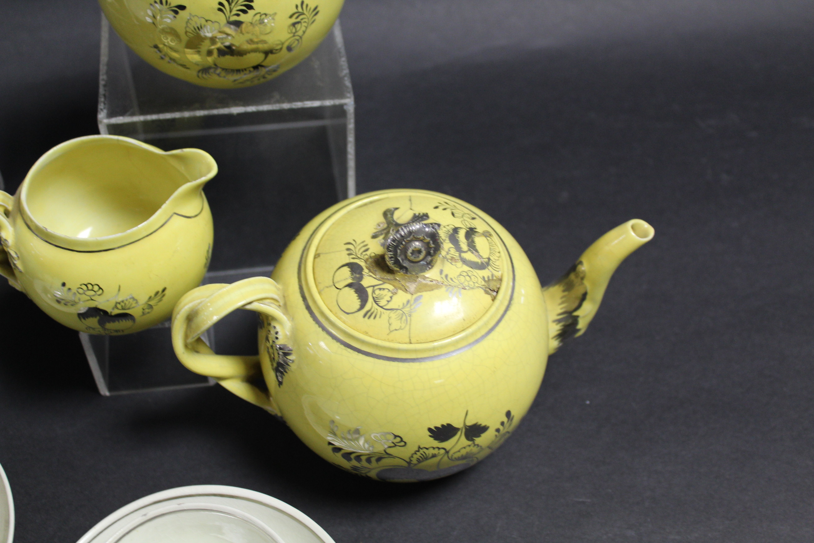 A yellow ground & silver-resist bullet shaped teapot with interwoven strap handle, & matching - Image 2 of 5