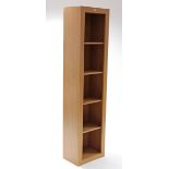 A woodgrain-effect tall standing five-tier open bookcase, 17 ¾” wide x 73 ½” high; a similar pair of