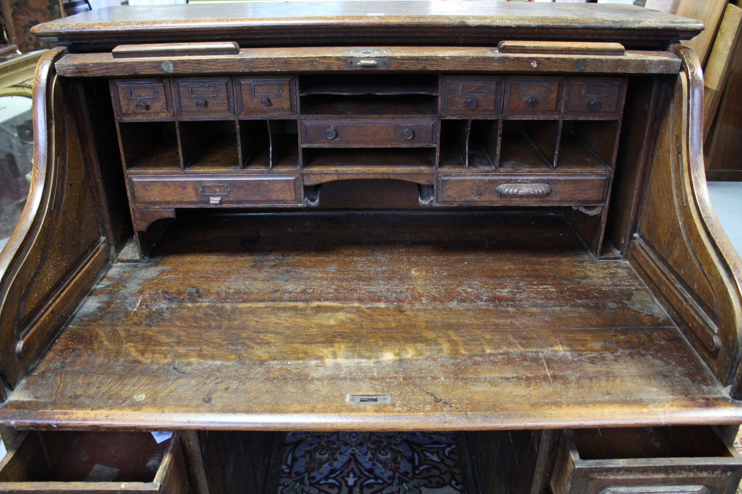 A late Victorian roll-top desk, with fitted interior enclosed by tambour shutter, fitted with an - Image 4 of 5