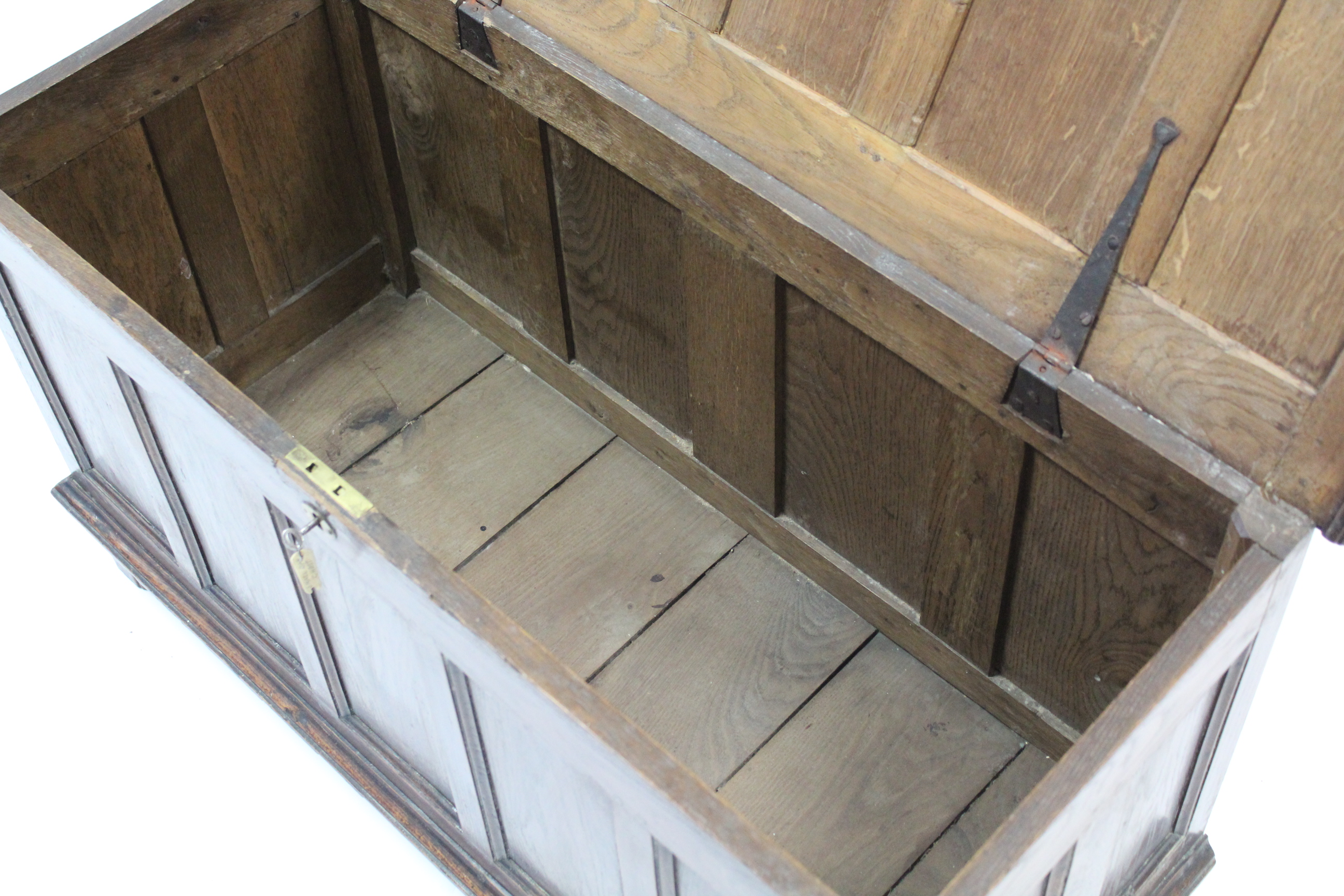 A late 19th/early 20th century small oak coffer with hinged lift-lid, with panelled front & sides, & - Image 3 of 3