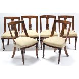 A set of six late 19th century mahogany Athenian-style dining chairs with padded seats, & on