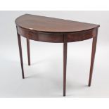 A mahogany demi-lune side table on square tapered legs, 37½” wide; together with a pair of oak