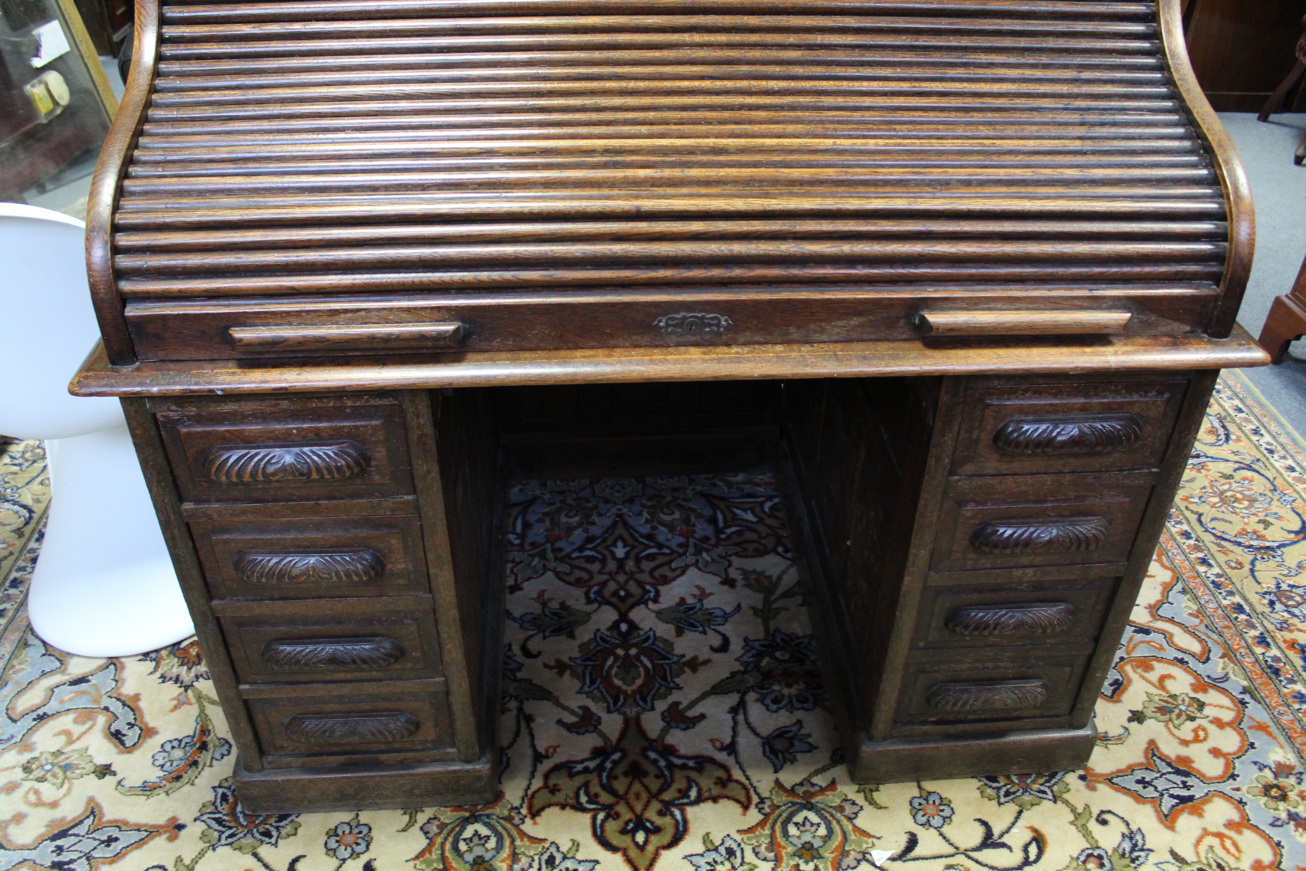 A late Victorian roll-top desk, with fitted interior enclosed by tambour shutter, fitted with an - Image 3 of 5