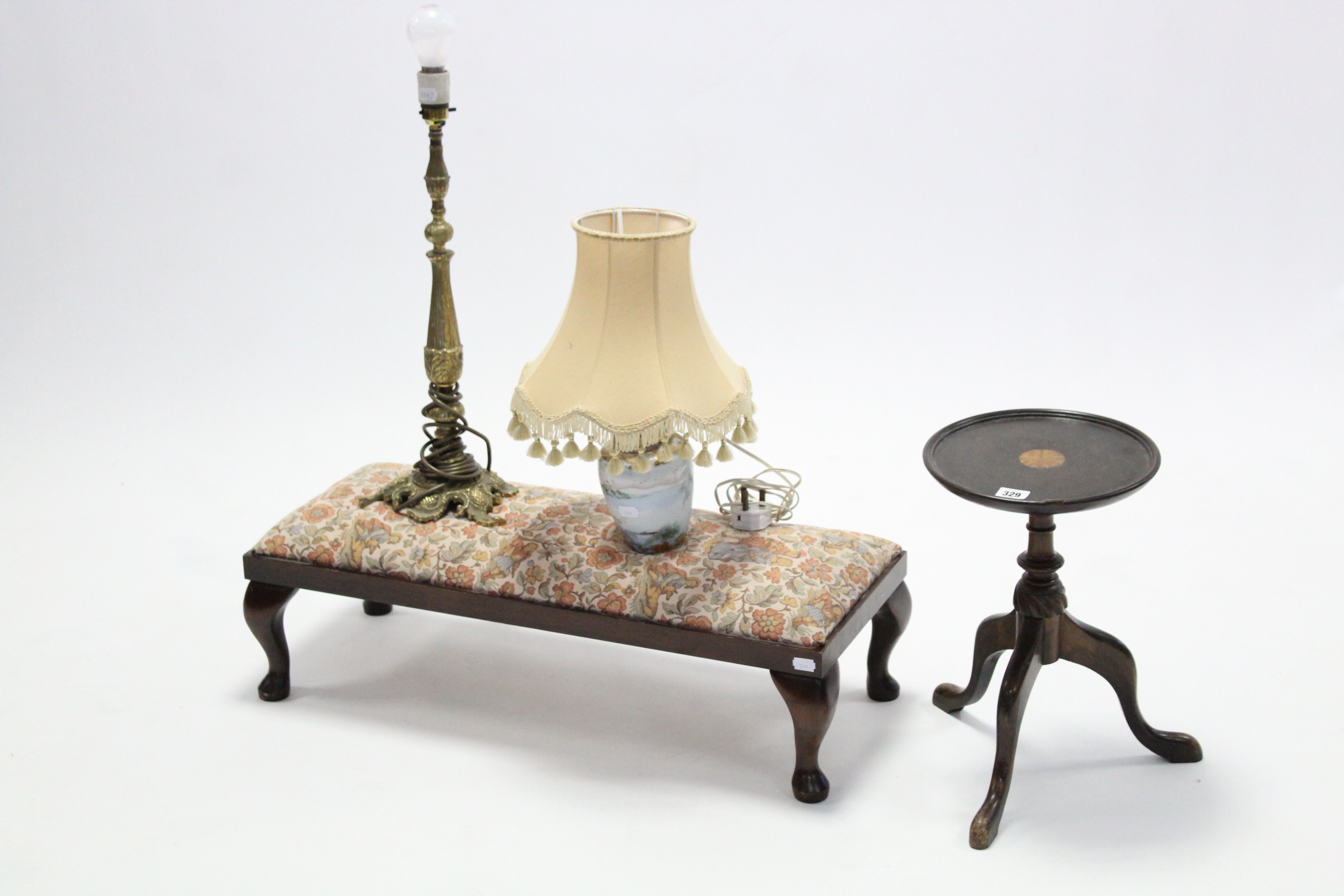 An inlaid-mahogany wine table, 9¾” diam.; together with a rectangular footstool; & two table lamps.