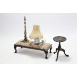 An inlaid-mahogany wine table, 9¾” diam.; together with a rectangular footstool; & two table lamps.