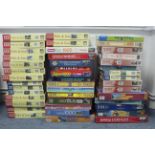 Approximately eighty various jig-saw puzzles, all boxed, some as new.