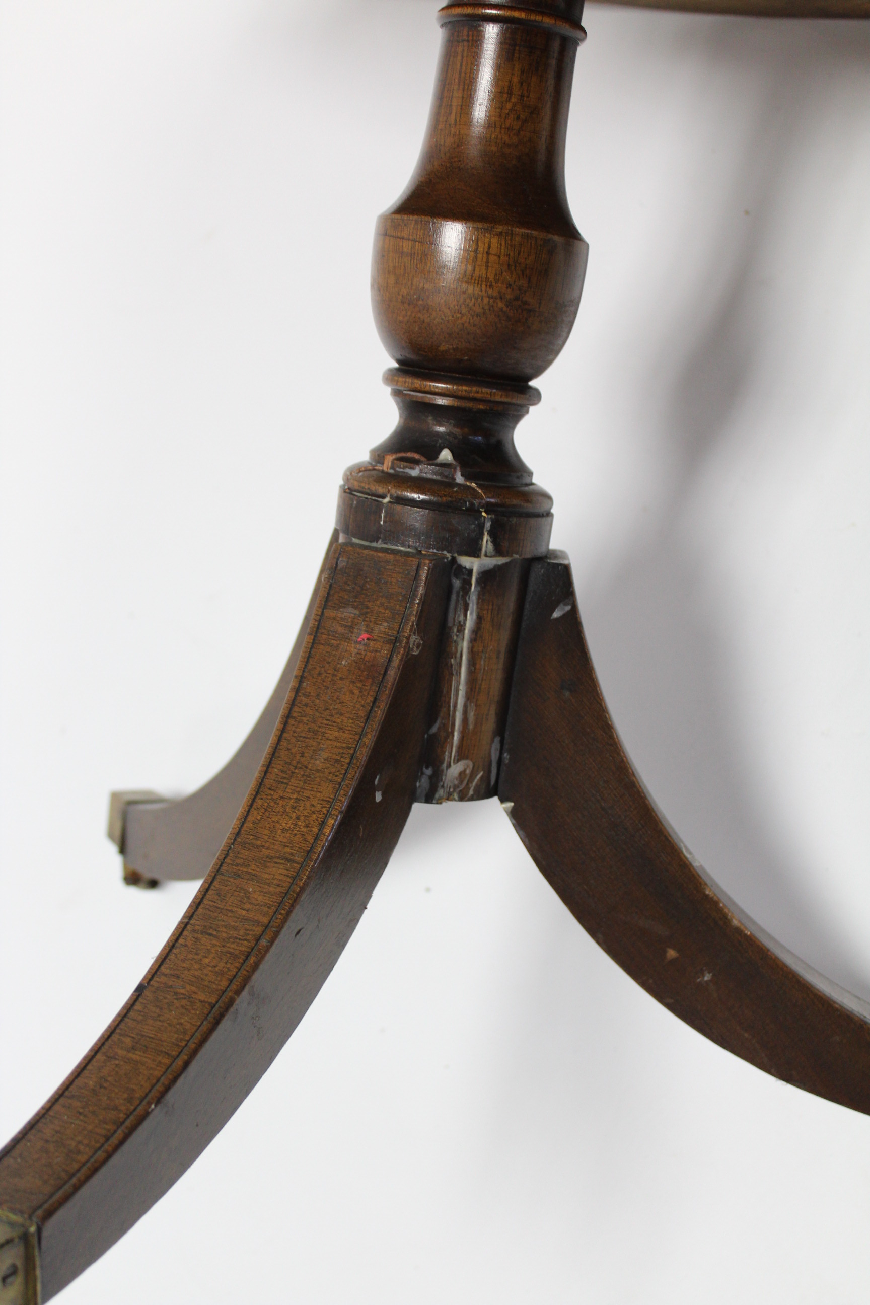 A reproduction mahogany book table inset gilt-tooled grey leather to the circular revolving top, - Image 4 of 4