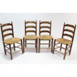 A set of four continental ash ladder-back dining chairs with woven-rush seats, & on turned legs with