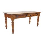 A PINE FARMHOUSE TABLE with rounded corners to the rectangular top, fitted two frieze drawers, &