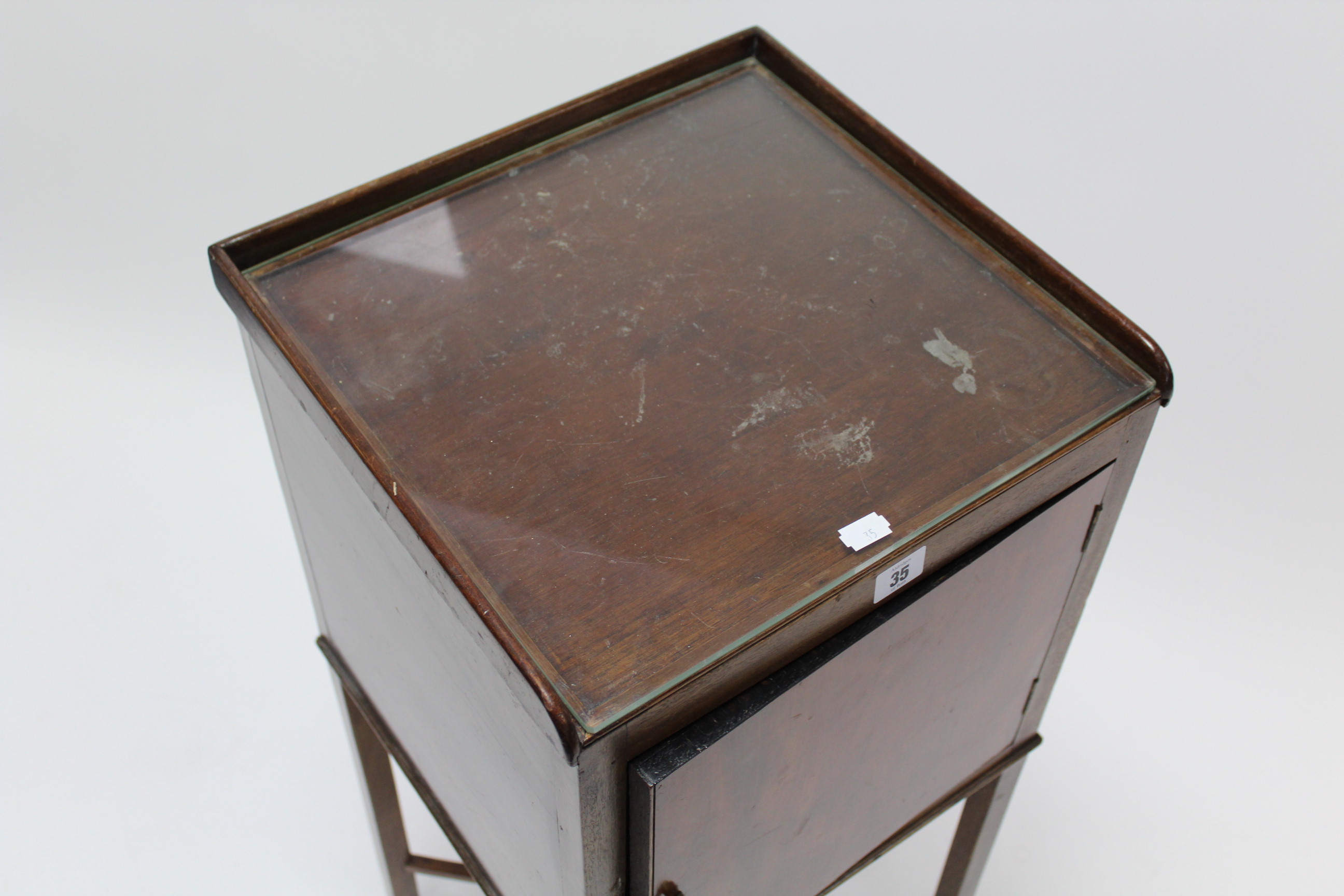 A late 19th/early 20th century mahogany tray-top bedside cabinet enclosed by panel door, & on square - Image 4 of 4