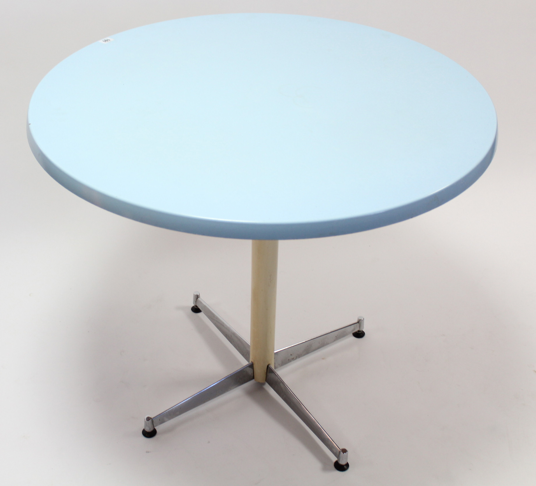 A cream-finish & natural chrome kitchen table with pale blue laminate circular top, 35½” diam.