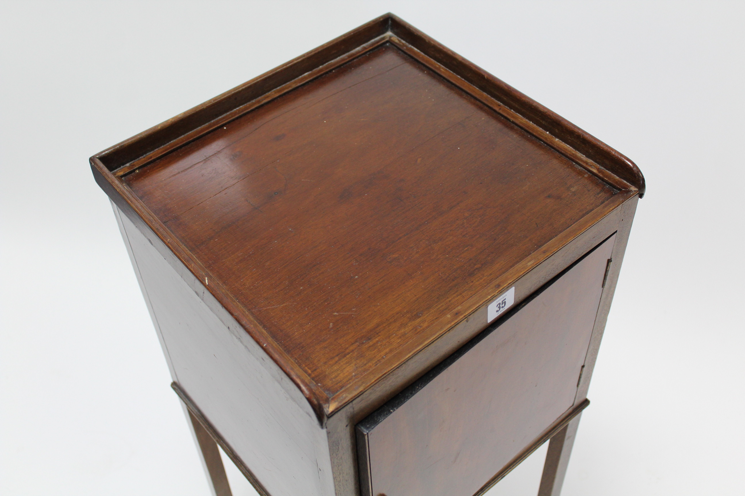 A late 19th/early 20th century mahogany tray-top bedside cabinet enclosed by panel door, & on square - Image 3 of 4