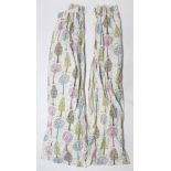 Two pairs of lined curtains of white ground & with repeating multi-coloured tree design 84” drop x