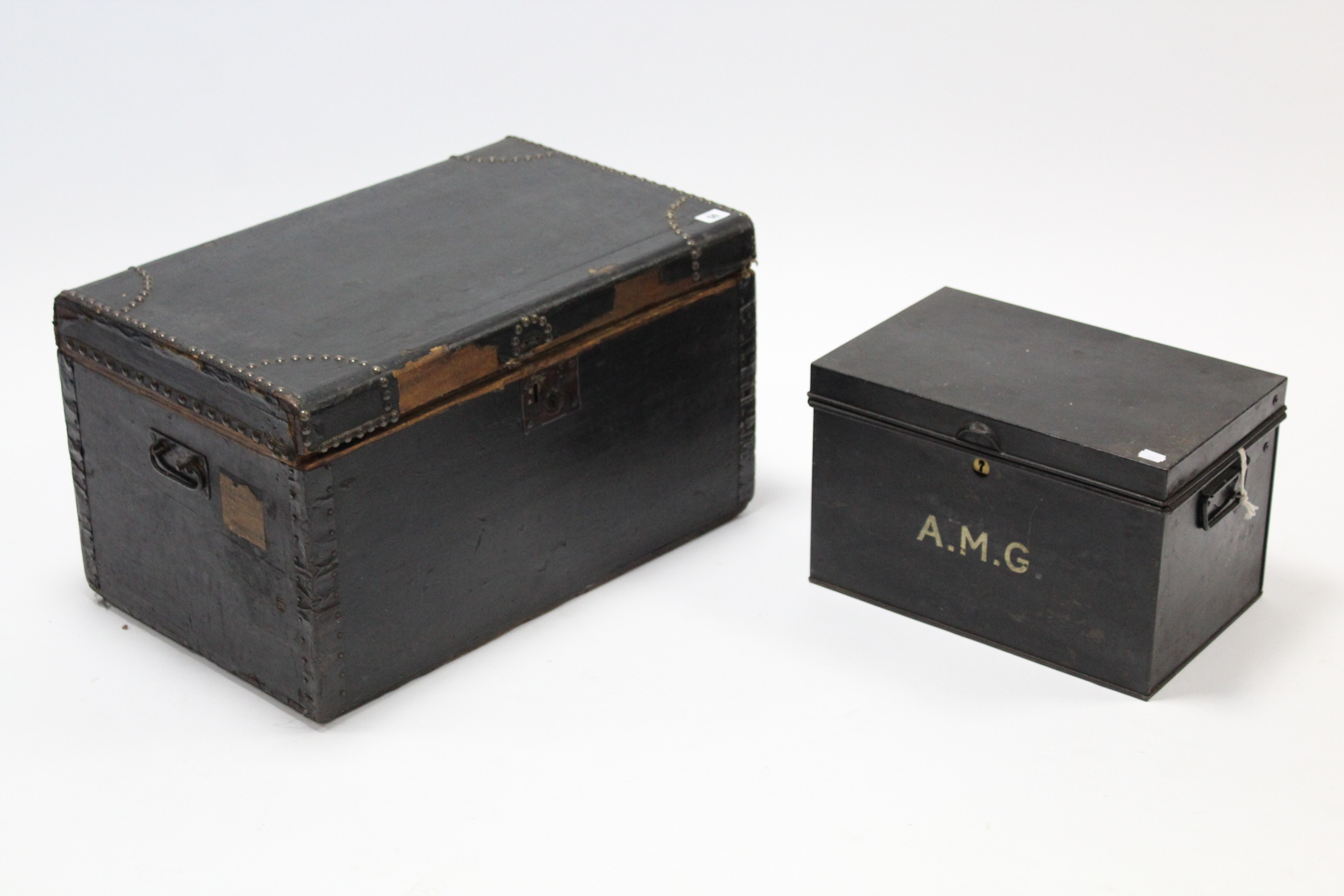 A fibre-covered deal travelling trunk, 24¼” wide; & a Japanned-metal deed box.