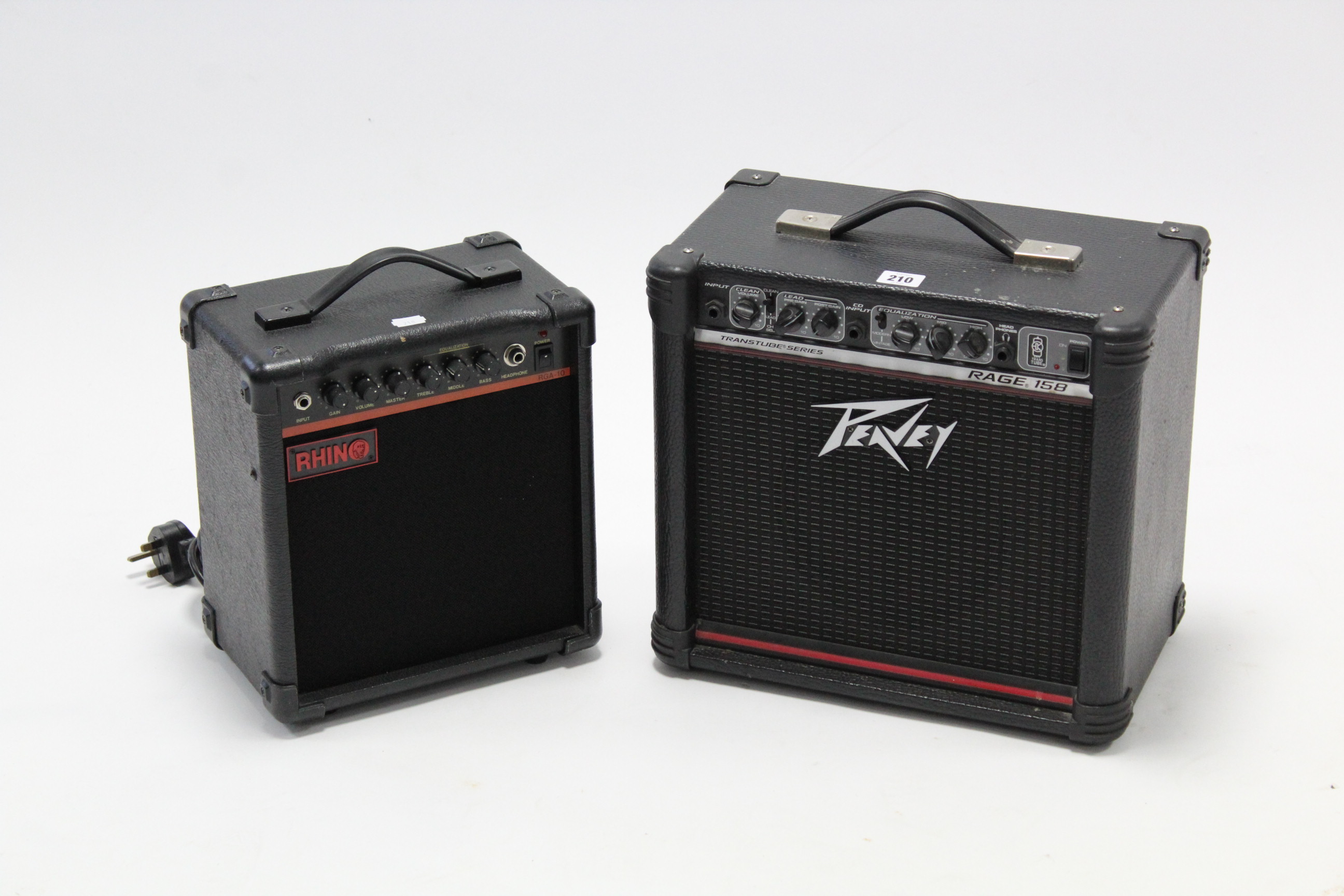 A Peavey “Rage 158” practice amplifier; & a Rhina “RGA-10” ditto.