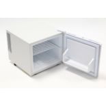 A Caldura counter-top small refrigerator in white-finish case, 15” wide x 13½” high, w.o.