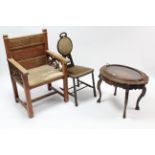 An inlaid & carved hardwood oval tray-top occasional table, 28” wide; together with two chairs, part