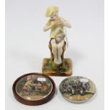 A Royal Worcester figure modelled by F. Gerther, titled “Peter Pan” (No. 3011); together with two