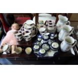 165. A Victorian china floral decorated extensive thirty-four piece part tea service; a set of three