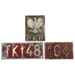 A painted cast-iron wagon plate “164”, 6¼” x 10¾”; a cast-iron plaque “PKP”, 9½” x 7½”; & an