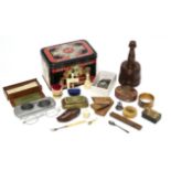 A Victorian carved ivory sewing clamp; a ditto pin cushion; a Mauchlin ware drum-shaped pill box &